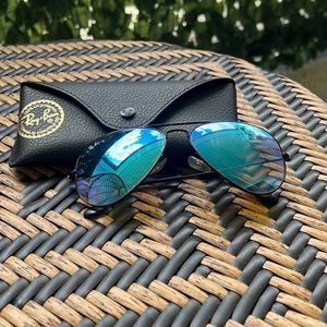 Black ray ban with blue lenses
